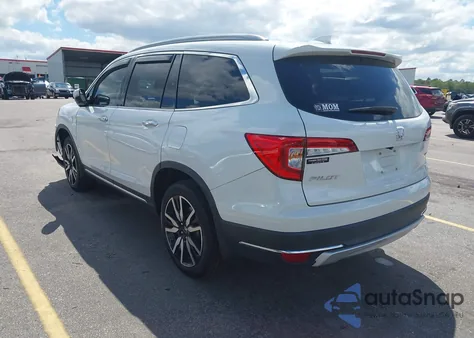 2021 Honda Pilot 2Wd Touring 8 Passenger from USA, damaged, VIN 5FNYF5H92MB001689